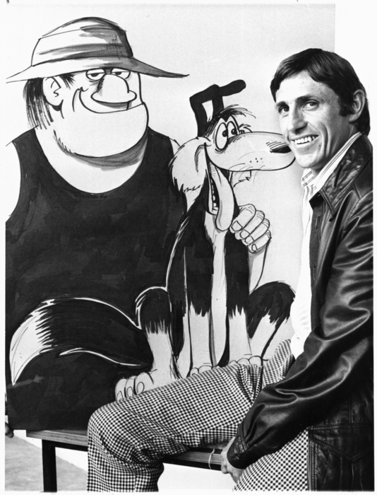 Murray Ball with two characters from Footrot Flats. Dominion post (Newspaper) :Photographic negatives and prints of the Evening Post and Dominion newspapers. Ref: EP-Portraits of New Zealanders-Ball, Murray-01. Alexander Turnbull Library, Wellington, New Zealand. http://natlib.govt.nz/records/23111673